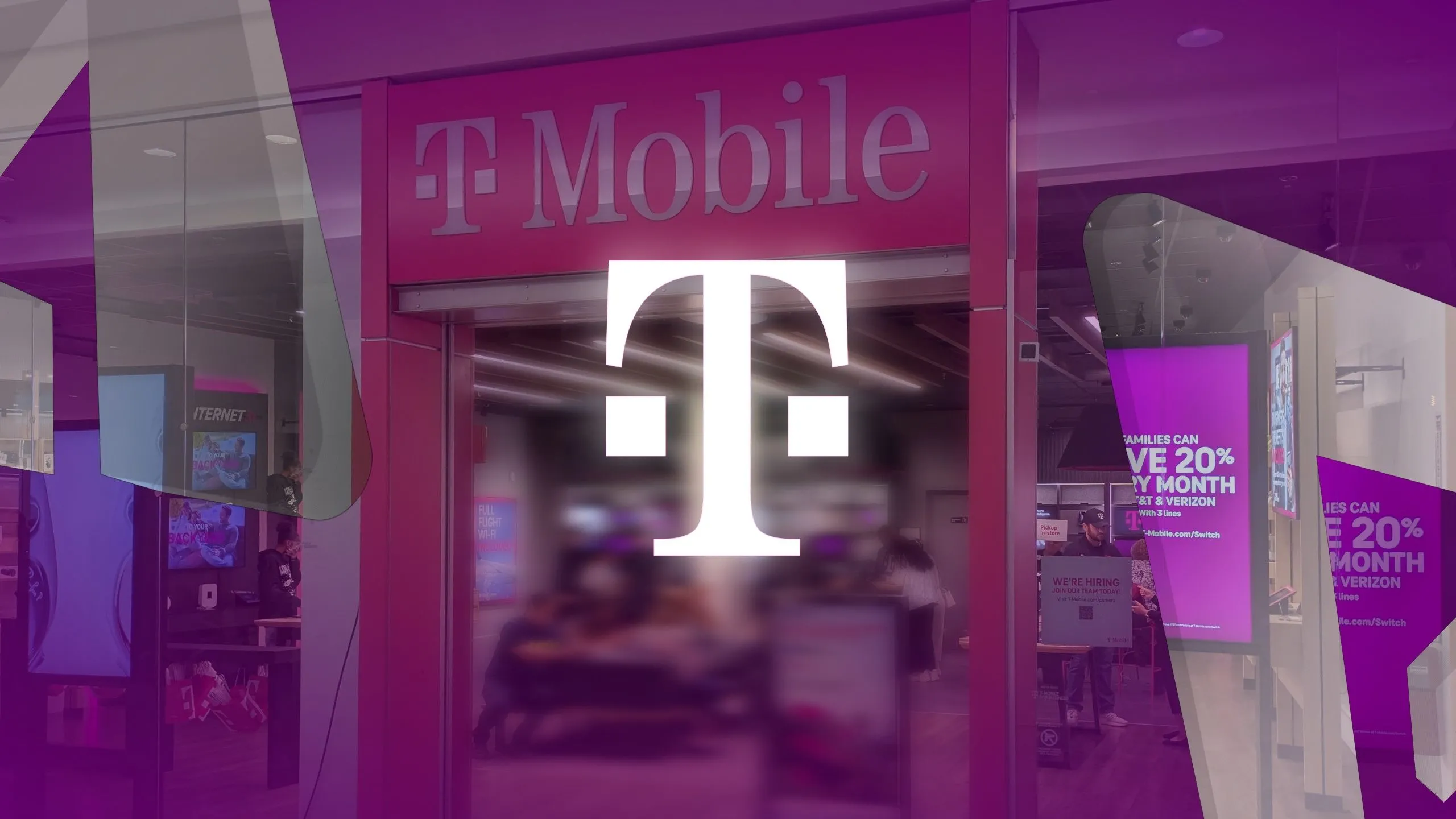 Logo T-Mobile nổi bật trên nền cửa hàng bán lẻ của hãng.