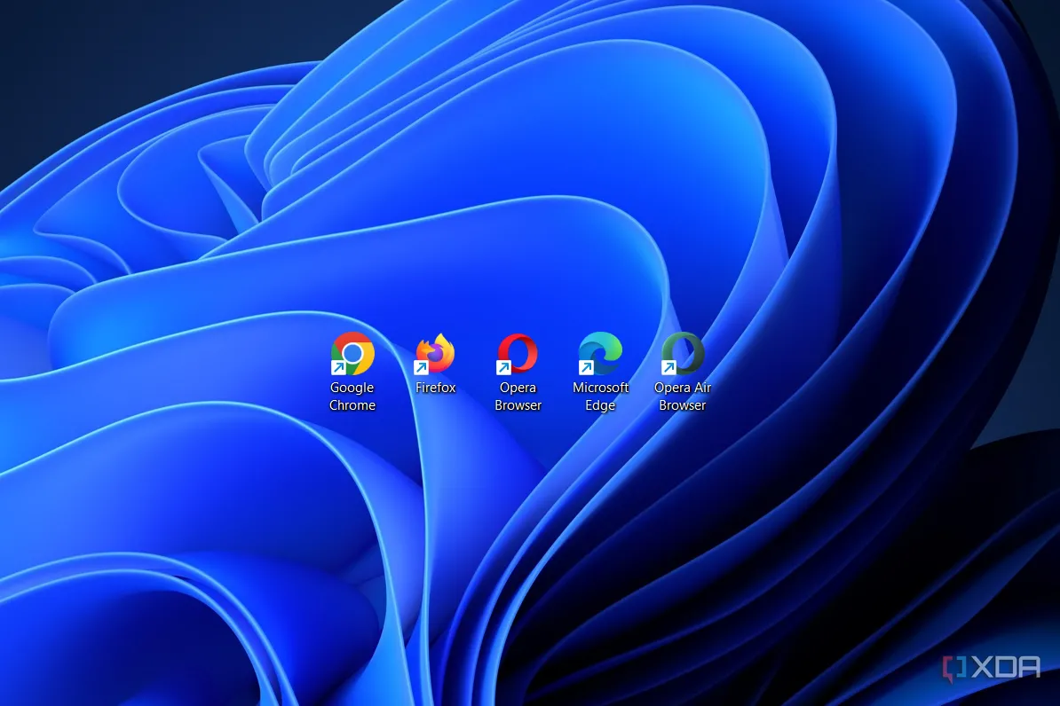 Các biểu tượng lối tắt của nhiều trình duyệt web trên màn hình nền Windows 11, thể hiện khái niệm phân chia trình duyệt.