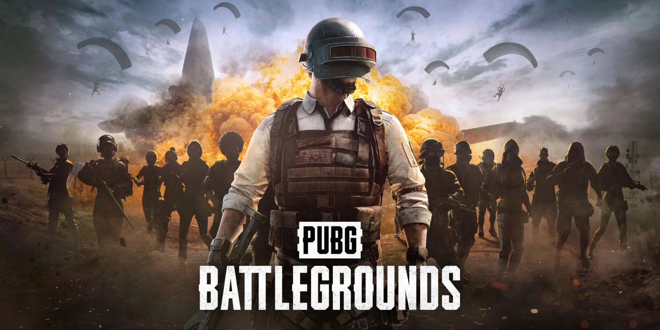 Ảnh bìa game PUBG Battlegrounds với cảnh chiến đấu trong môi trường hoang tàn