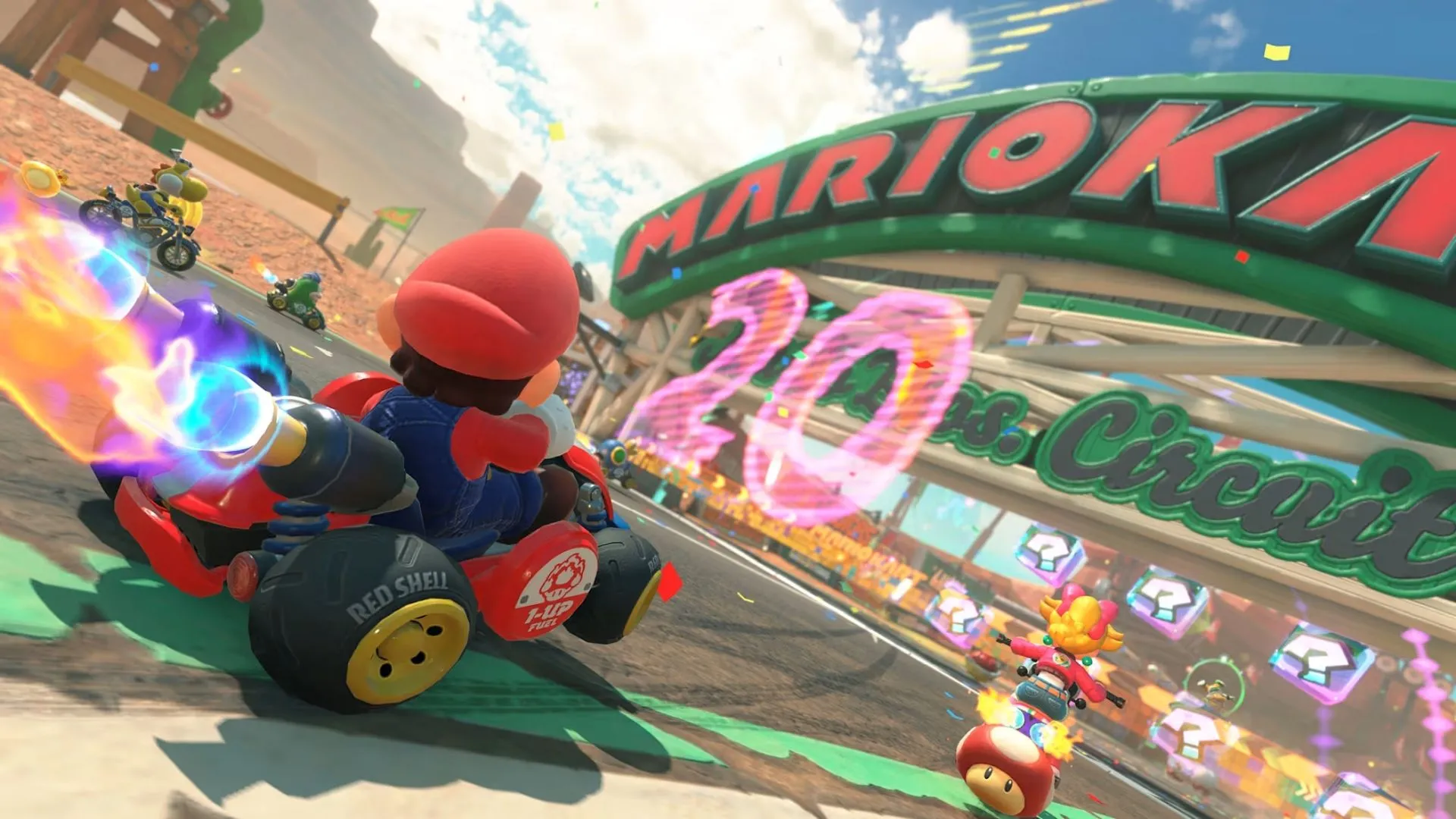 Các tay đua Mario Kart World lướt qua thành phố ảo đầy màu sắc trong chế độ Knockout Tour