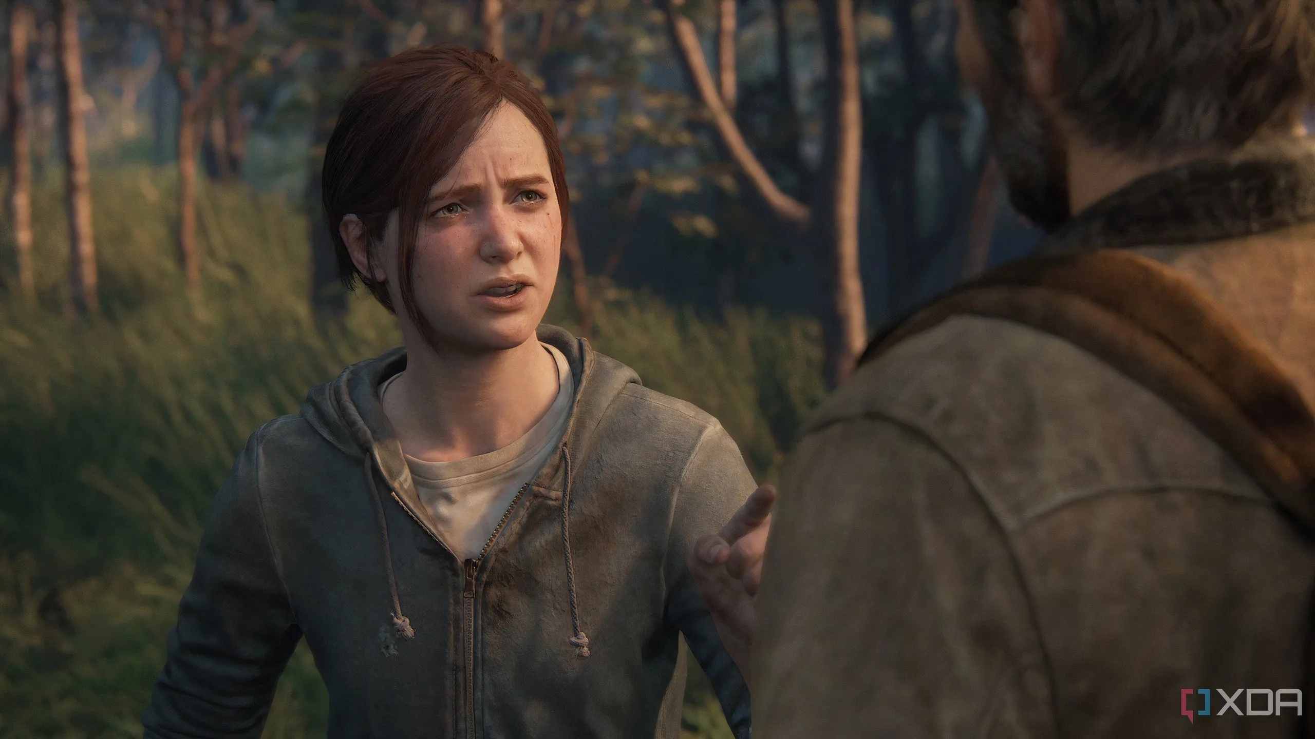 Cảnh đối thoại đầy cảm xúc giữa Ellie và Joel trong The Last of Us Part II Remastered, làm nổi bật sự phức tạp trong mối quan hệ cha con.