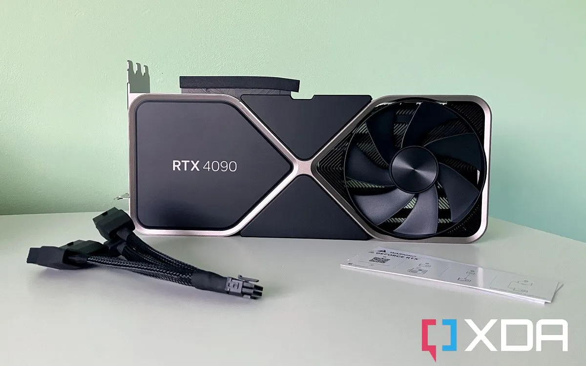 Card đồ họa NVIDIA RTX 4090 với các cổng kết nối và dây nguồn, minh họa yêu cầu công suất cao
