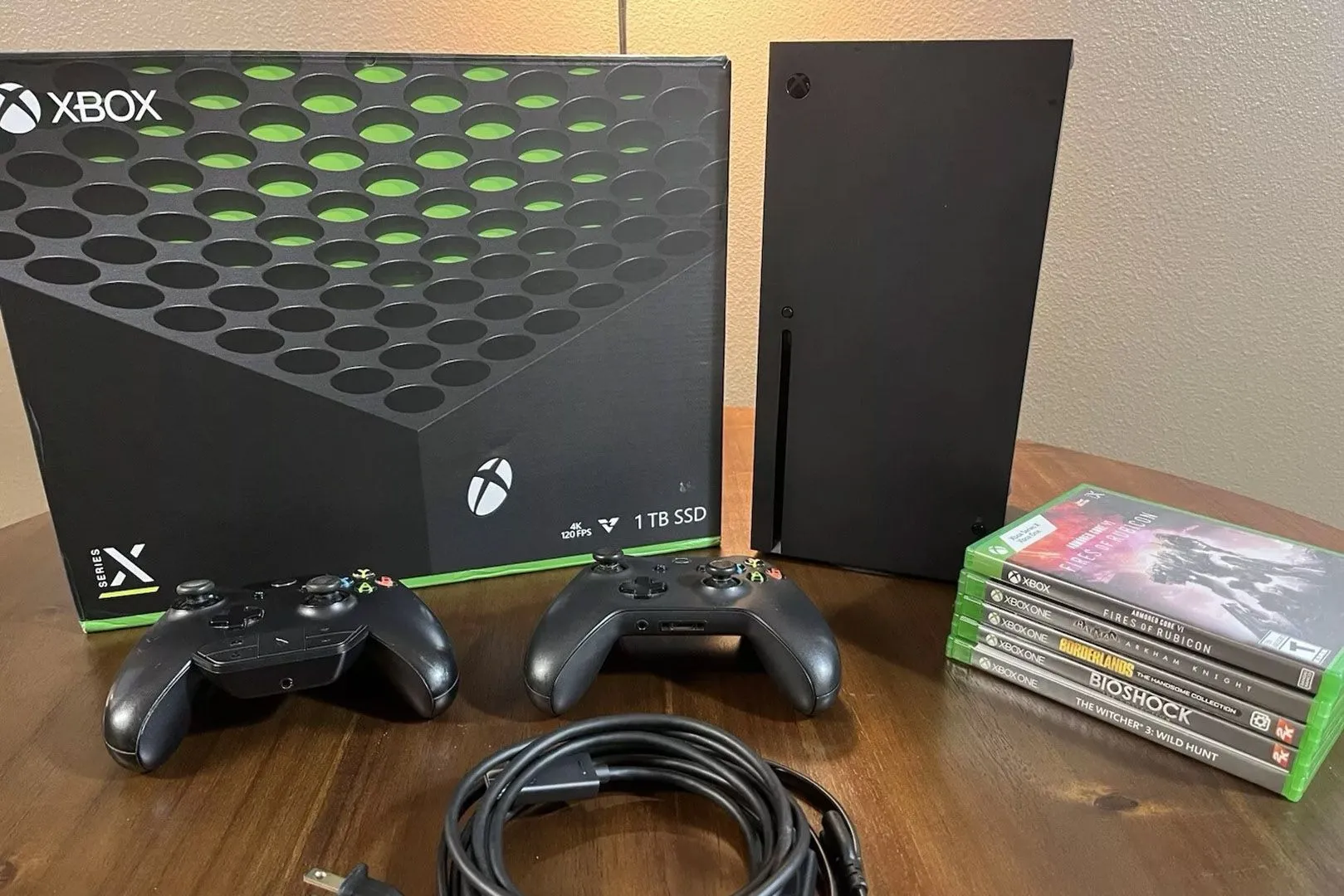 Console Xbox Series X với nhiều tựa game hiển thị trên màn hình, minh họa tính năng Quick Resume cho phép chuyển đổi nhanh giữa các trò chơi