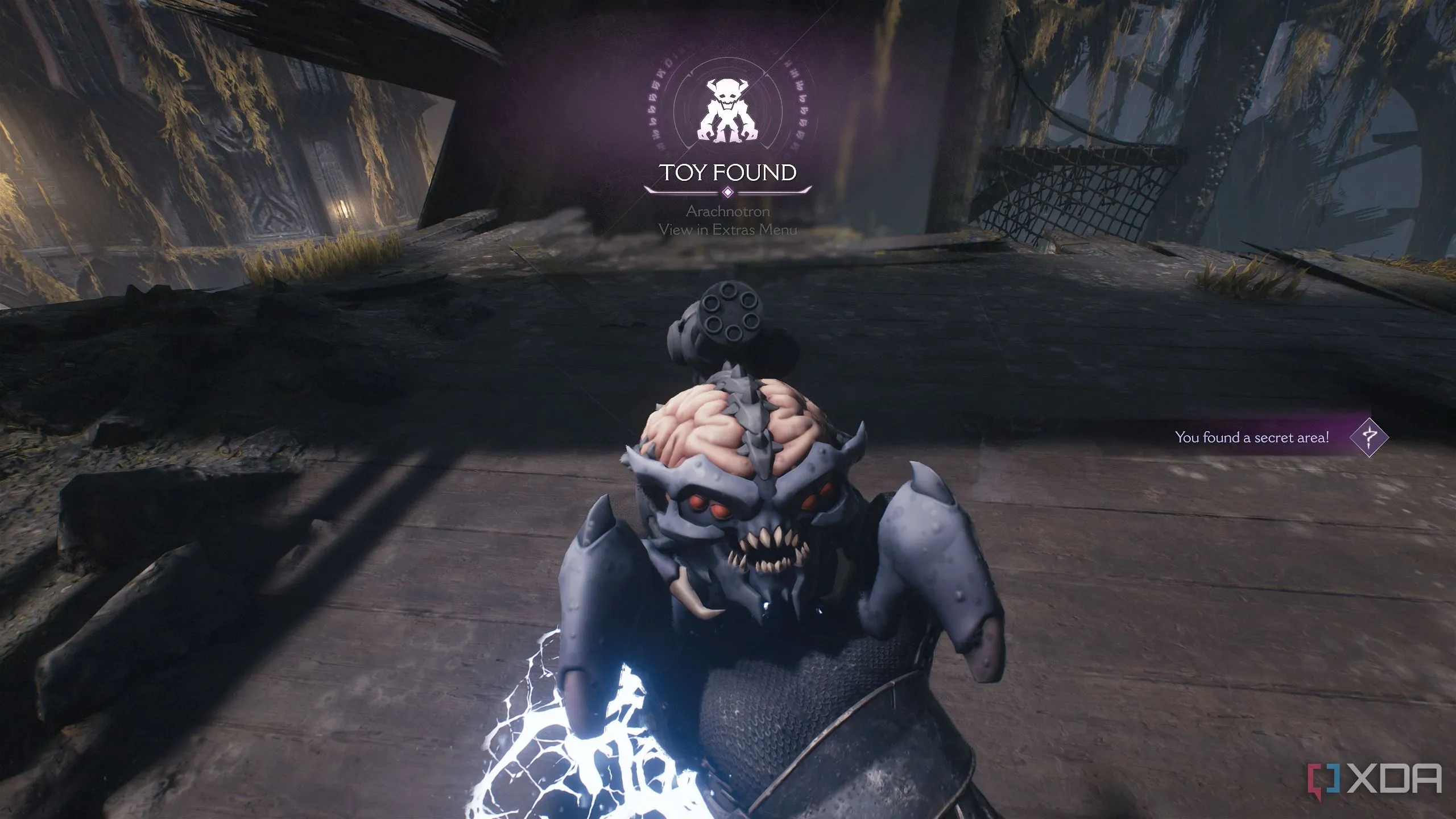 Đồ chơi quỷ Arachnotron được tìm thấy trong Chapter 14 của Doom: The Dark Ages.