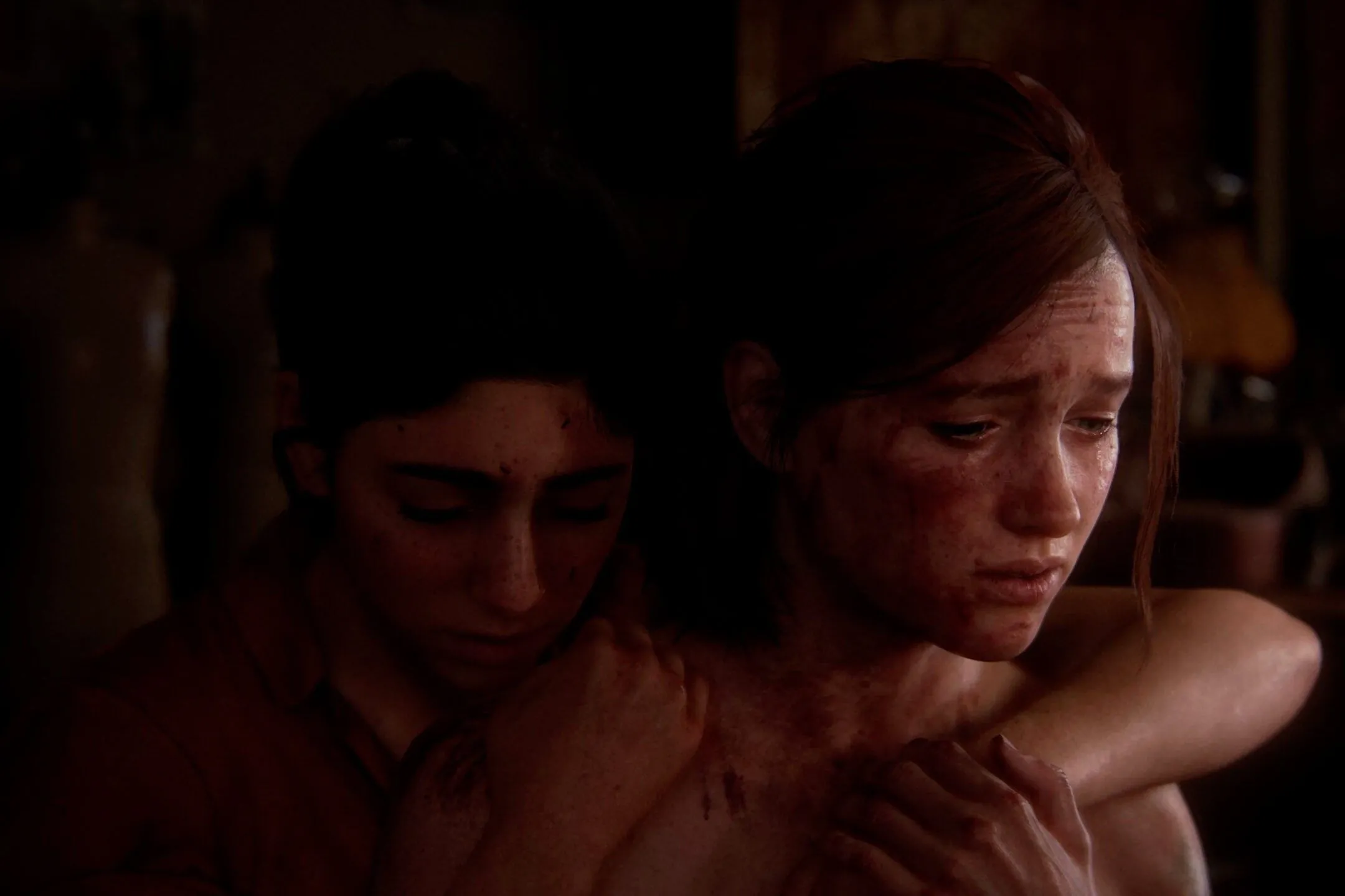 Ellie và Dina ôm nhau, thể hiện mối quan hệ sâu sắc giữa hai nhân vật nữ chính trong The Last of Us Part II.