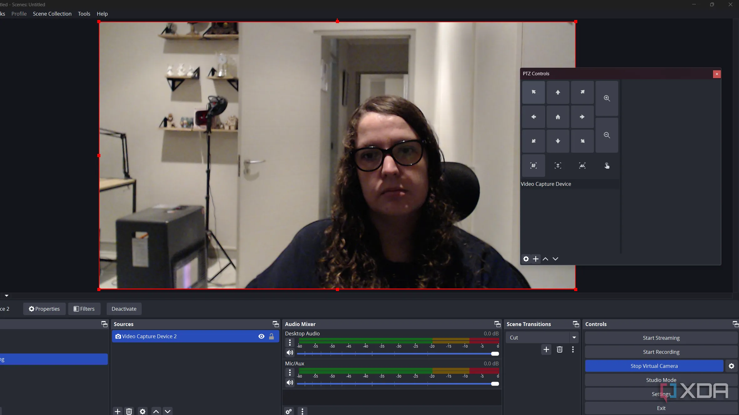 Giao diện điều khiển PTZ Controls trong OBS Studio, hiển thị các tùy chọn pan, tilt, zoom cho webcam.
