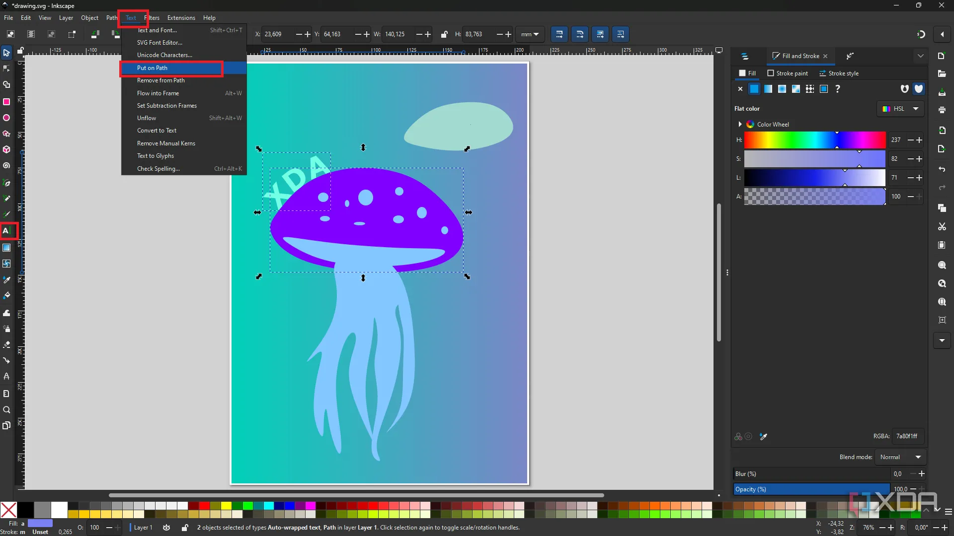 Giao diện Inkscape hiển thị các tùy chọn của công cụ văn bản, kèm theo ví dụ văn bản được đặt trên một đường dẫn trong hình minh họa con sứa.