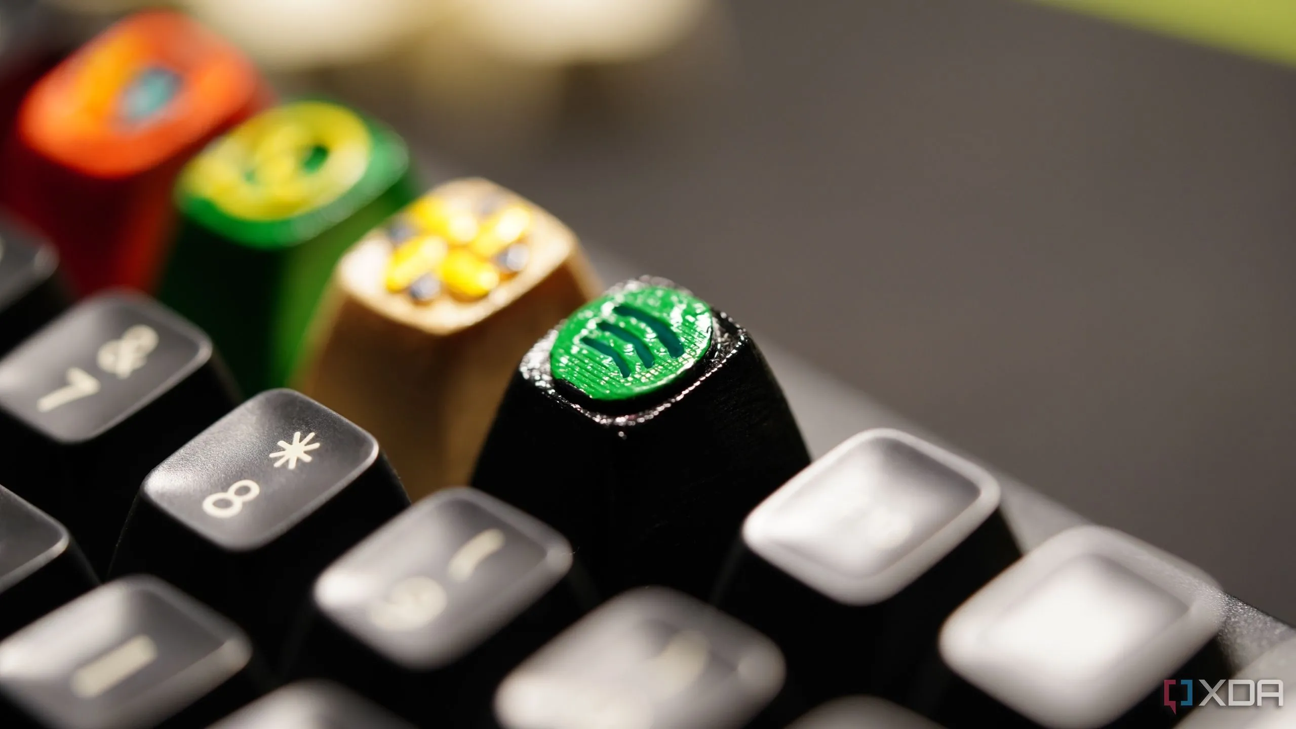 Keycap in 3D với logo Spotify tùy chỉnh, minh họa tiềm năng thiết kế riêng và kinh doanh