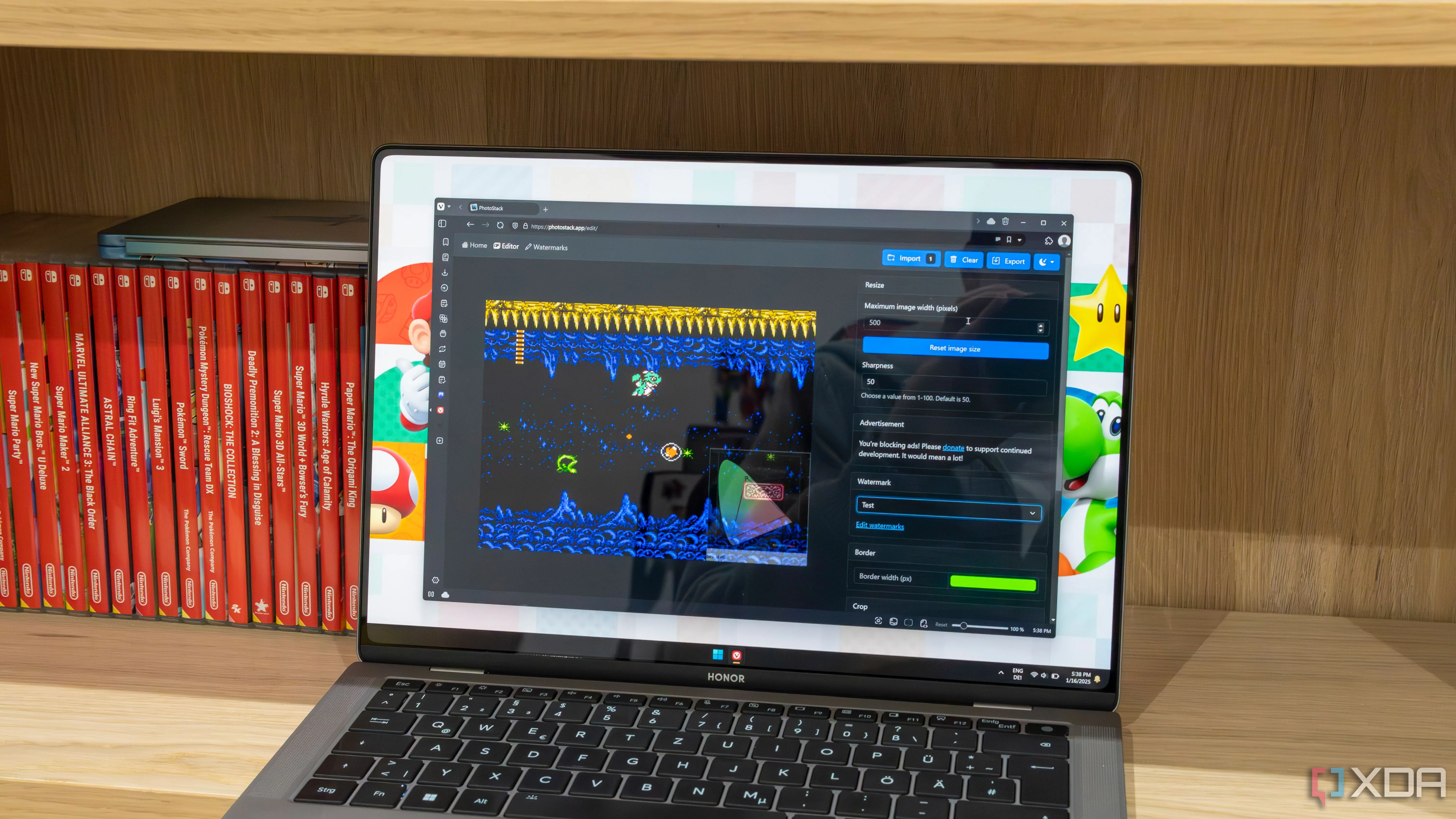Màn hình laptop Windows 11 hiển thị ứng dụng PhotoStack trên trình duyệt Vivaldi, minh họa trải nghiệm người dùng sau cập nhật