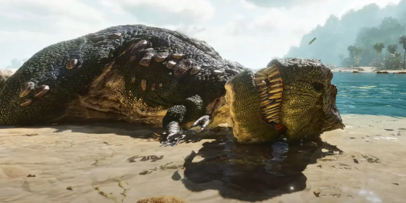 Một con khủng long đang nằm trên bãi biển trong Ark: Survival Ascended, với cảnh biển đẹp phía sau.