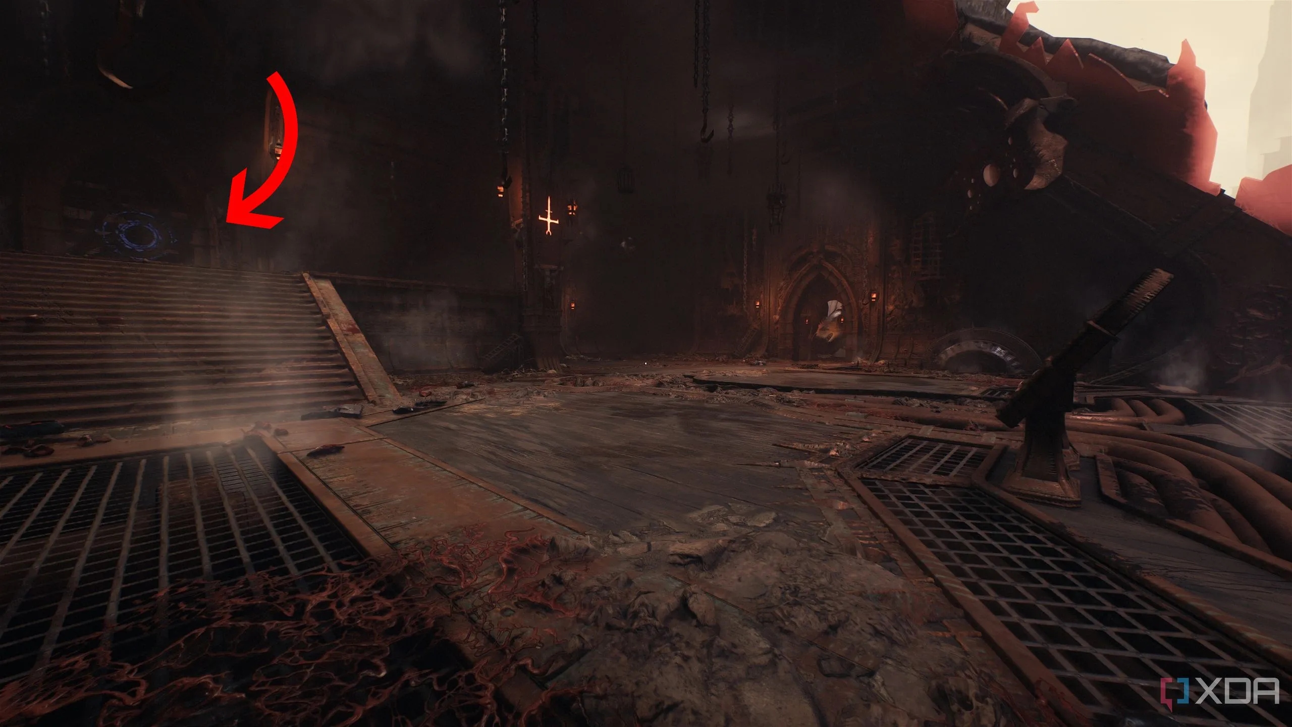 Mũi tên chỉ dẫn đến bức tường gỗ có biểu tượng Shield Bash trong tàu Hell Carrier đã rơi của Doom The Dark Ages.