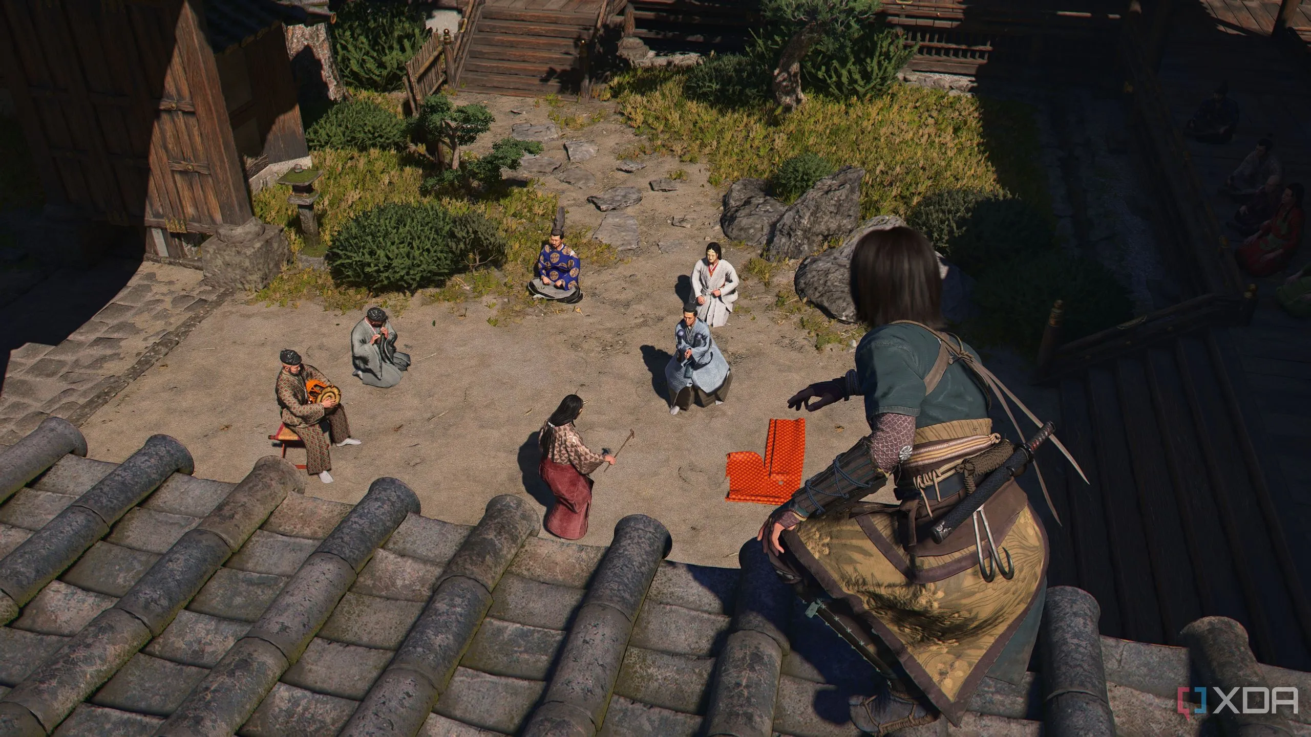Naoe thực hiện động tác parkour trên mỏm đá trong Assassin's Creed Shadows