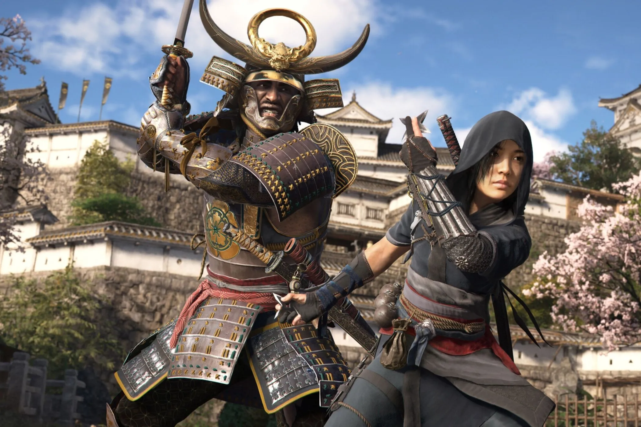 Naoe và Yasuke cùng đứng cạnh nhau, thể hiện sự linh hoạt trong lựa chọn nâng cấp kỹ năng và trang bị phù hợp với từng phong cách chơi trong Assassin's Creed Shadows.