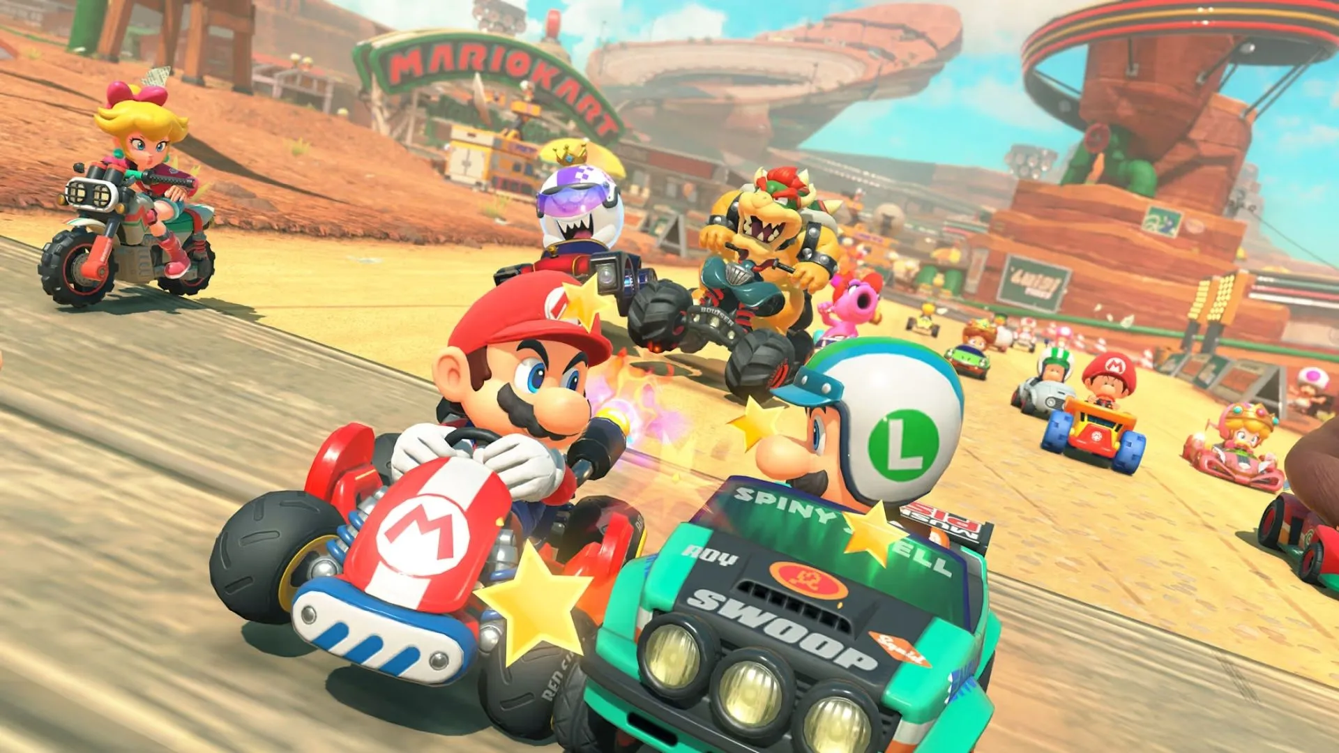 Nhân vật Peach điều khiển xe đua trên đường băng tuyết trong Mario Kart World